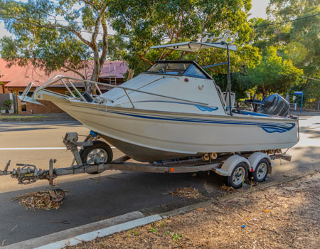 small boat on a trailer ready for transport